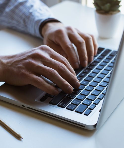 Man working on laptop computer